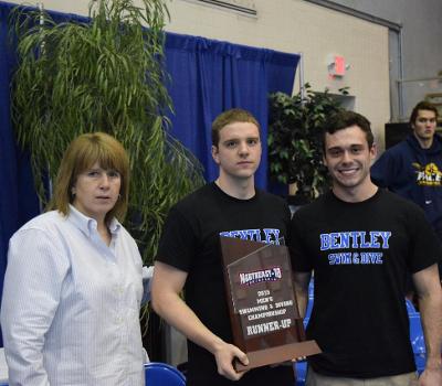 Bentley's captains accept the runner-up award from NE-10 Asst. Commissioner Kerry Fagan