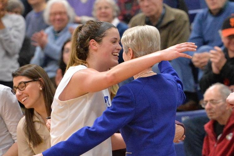 Coach Stevens congratulates Jen Gemma after the Falcon All-America became Bentley's all-time leading scorer Thursday night