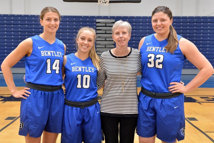 Coach Stevens with her seniors: Megan Lewis (14), Amy McConnell (10) and Victoria Lux (32)