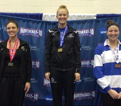 Paige Wilde at the top of the 3-meter podium along with Courtney Stone (r)